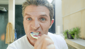 Man brushing his teeth