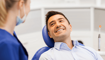 Man smiling in dental chair