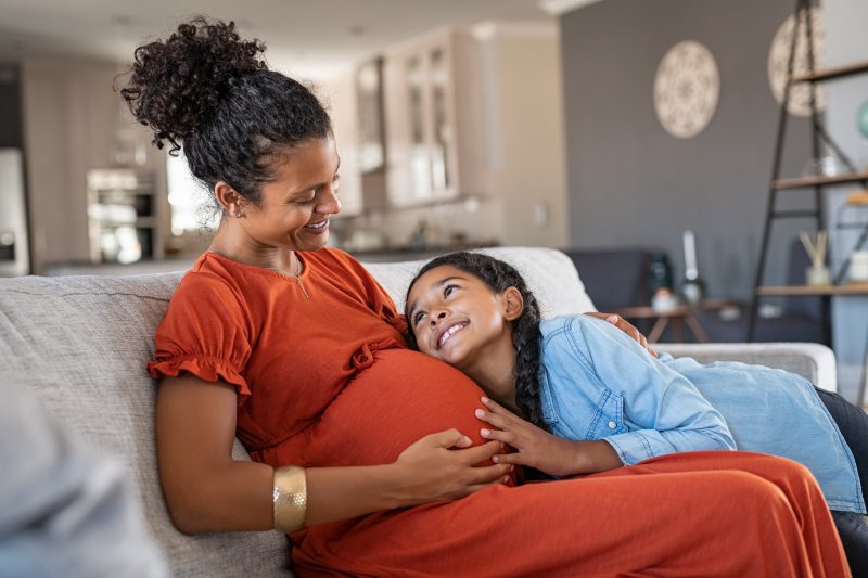 patient speaking with dentist about dental sedation while pregnant